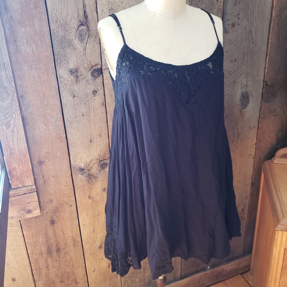 Black staccato spaghetti strap dress